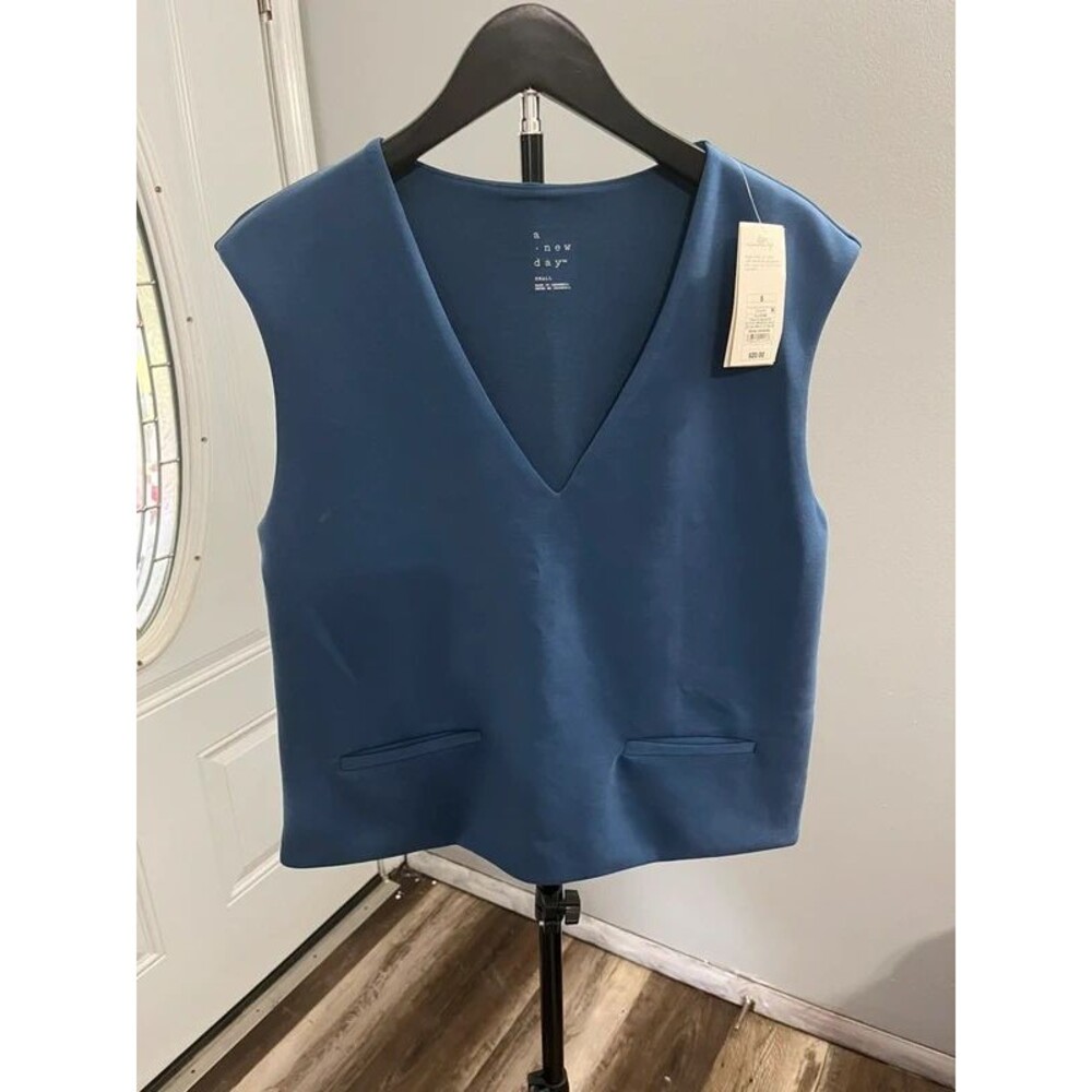 A new day blue vest shirt